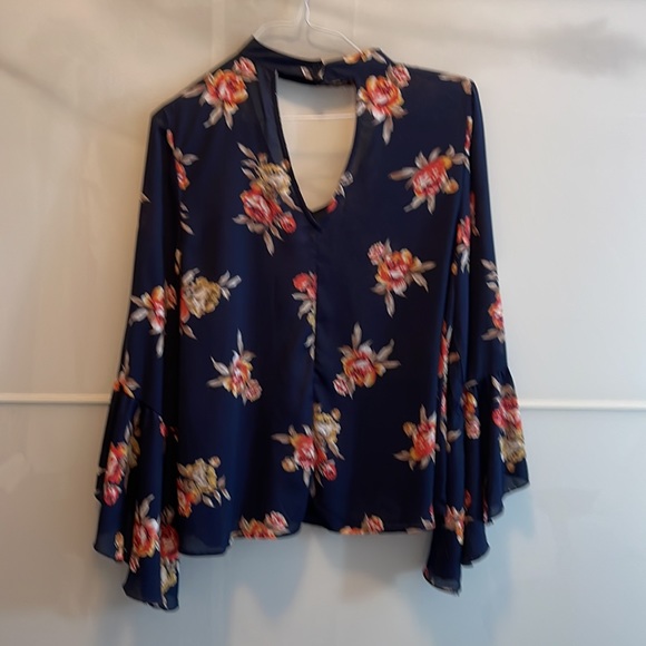 Blue lightweight top with flowers and bell sleeves. - Picture 5 of 6